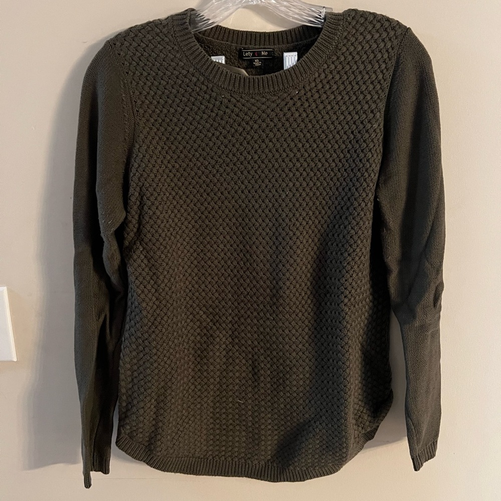 Olive green sweater with elbow patches.